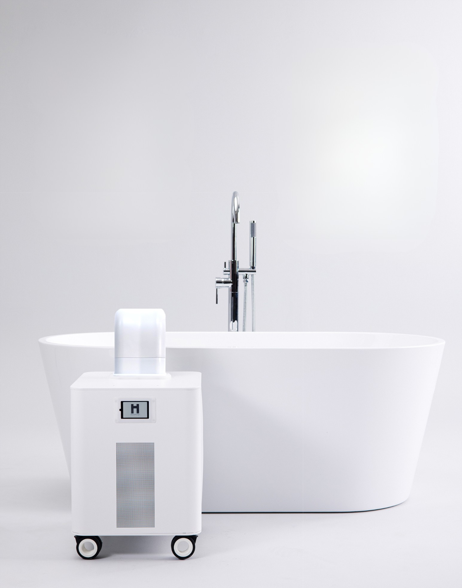 HomePlunge H3 cold plunge chiller beside a freestanding bathtub